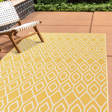 turks & caicos yellow geometrical outdoor rug